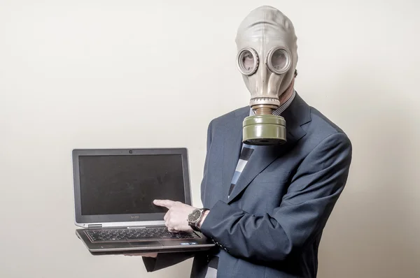 Businessman with gas mask with notebook — Stock Photo, Image