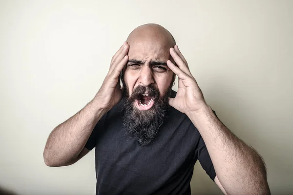 Desperate bearded man isolated — Stock Photo, Image