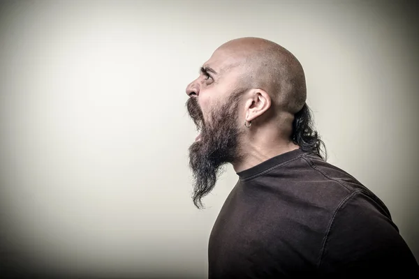 Profile screaming angry bearded man — Stok fotoğraf