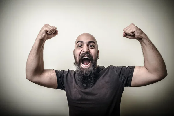 Fuerte ganador barbudo hombre —  Fotos de Stock