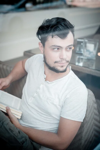 Young stylish man reading a book — Stock Photo, Image