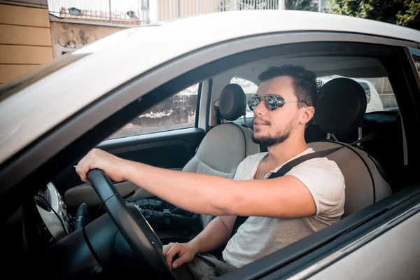 Stylish man driving car — Stock Photo, Image