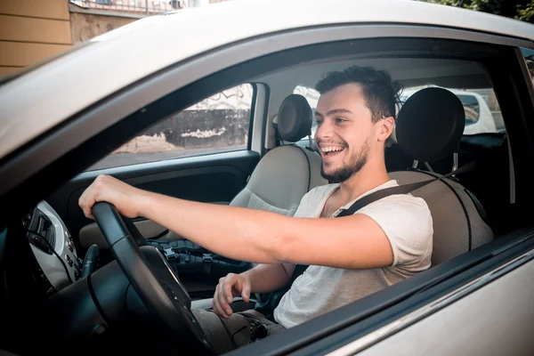 Stylish man driving car — Stock Photo, Image