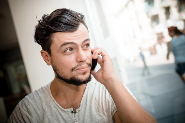 Young stylish man at the bar — Stock Photo, Image