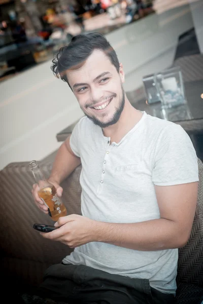 Young stylish man at the bar — Stock Photo, Image