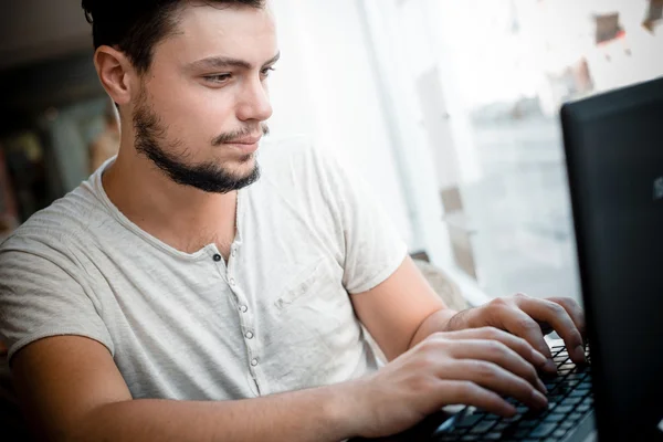 Young stylish man at the bar — Stock Photo, Image