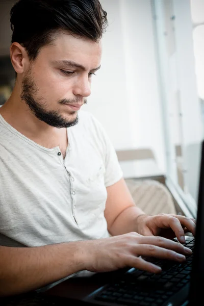 Young stylish man at the bar — Stock Photo, Image