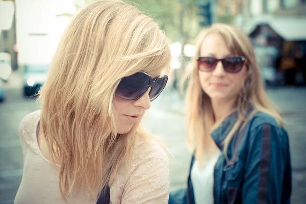 Beautiful blonde woman shopping on bike — Stock Photo, Image