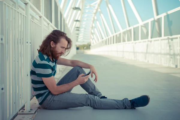 Stylish hipster model with long red hair and beard lifestyle on — Stock Photo, Image