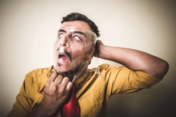 Verstikkende man met de plastic — Stockfoto