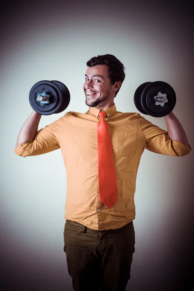 Lustiger verrückter junger Mann im Gewichtheben — Stockfoto