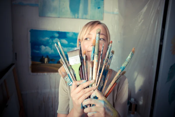 Beautiful blonde woman painter — Stock Photo, Image