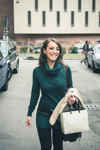 Beautiful woman with turtleneck walking in the city — Stock Photo, Image