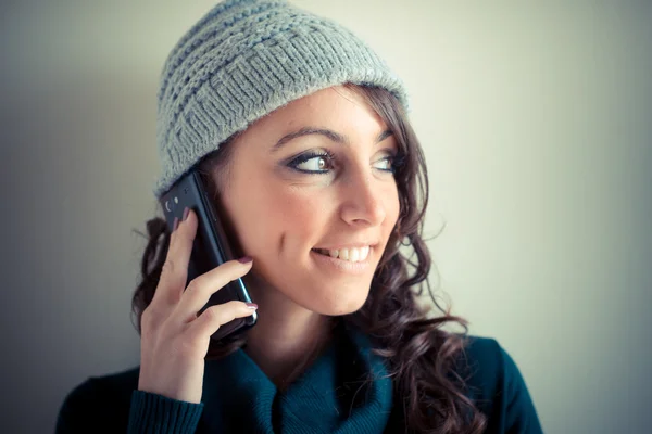 Beautiful woman with turtleneck walking in the city — Stock Photo, Image