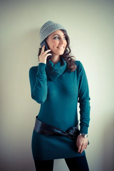 Beautiful woman with turtleneck walking in the city — Stock Photo, Image