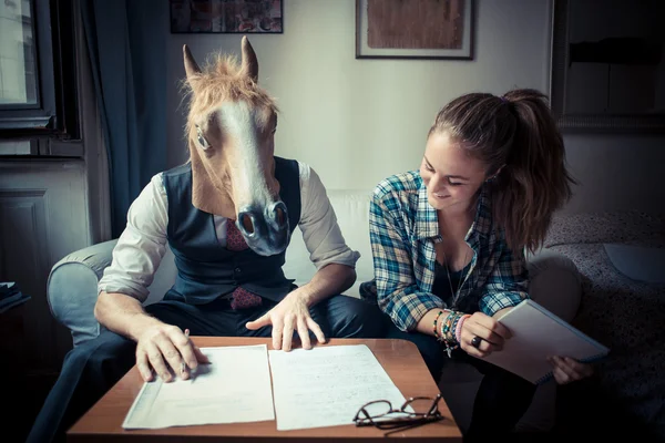 Máscara de caballo hombre y mujer trabajando —  Fotos de Stock