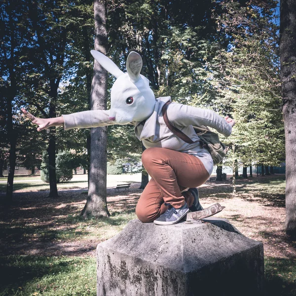 Young hipster rabbit mask woman in autumn — Stock Photo, Image