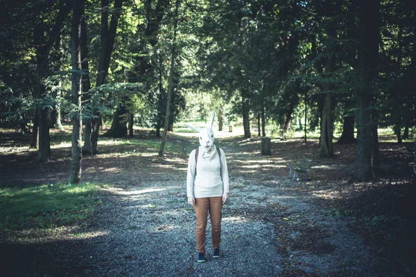 Young hipster rabbit mask woman in autumn — Stock Photo, Image