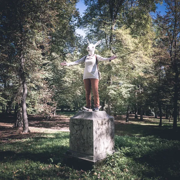 Young hipster rabbit mask woman in autumn — Stock Photo, Image