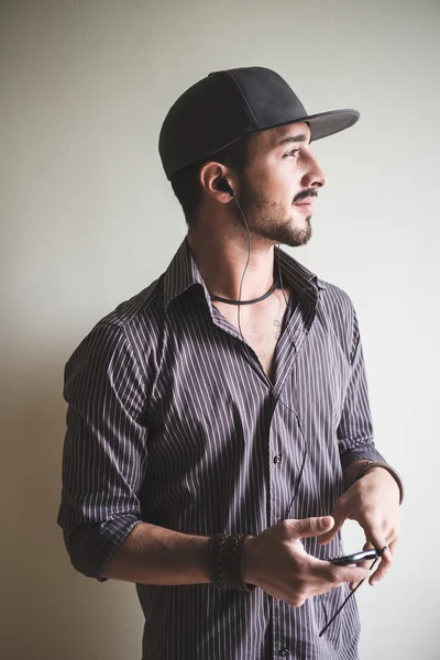 Young stylish man with sport hat — Stock Photo, Image