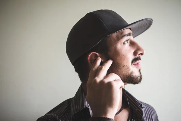 Young stylish man with sport hat — Stock Photo, Image
