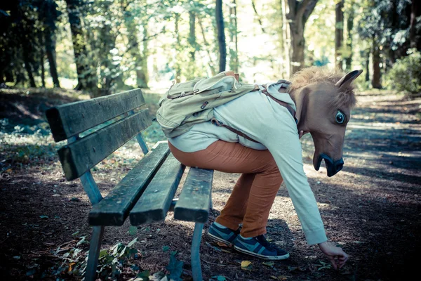 Young hipster horse mask woman in autumn — Stock Photo, Image