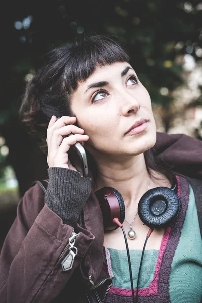 Beautiful young woman calling — Stock Photo, Image