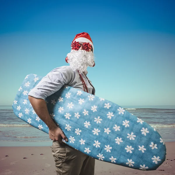 Funny santa claus surfer beach — Stock Photo, Image