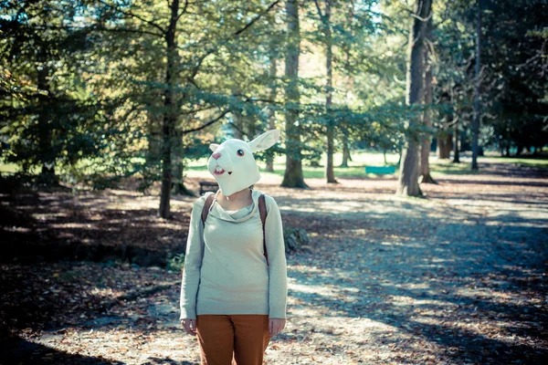 Young hipster rabbit mask woman in autumn — Stock Photo, Image