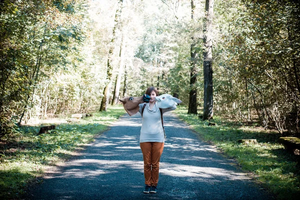 Blonde hipster girl in woodland — Stock Photo, Image