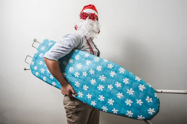 Divertente Santa Claus babbo natale ferro da stiro surfer — Foto Stock