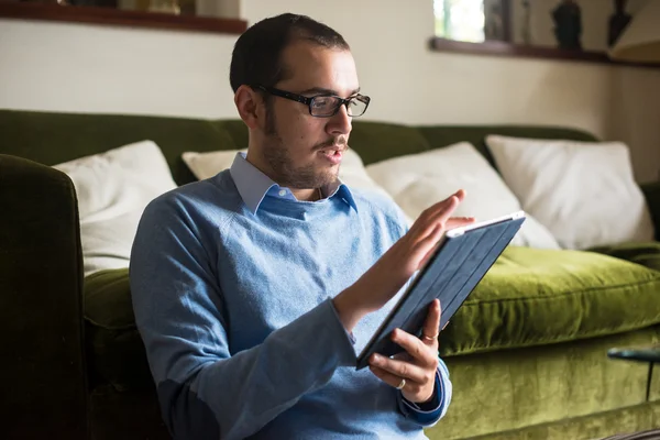 Elegant business multitasking multimedia man at home — Stock Photo, Image