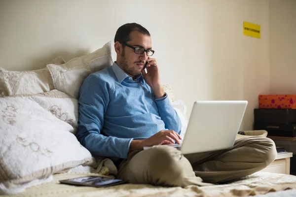 Elegant business multitasking multimedia man at home — Stock Photo, Image