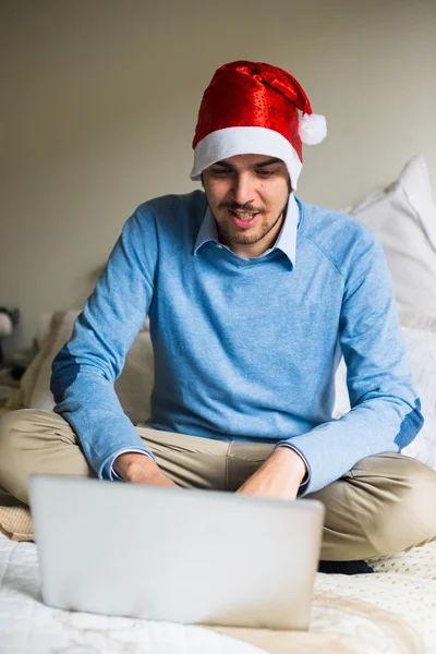 Elegant business multitasking christmas man at home — Stock Photo, Image