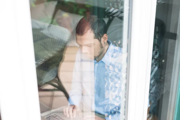 Elegant business multitasking multimedia man at home — Stock Photo, Image