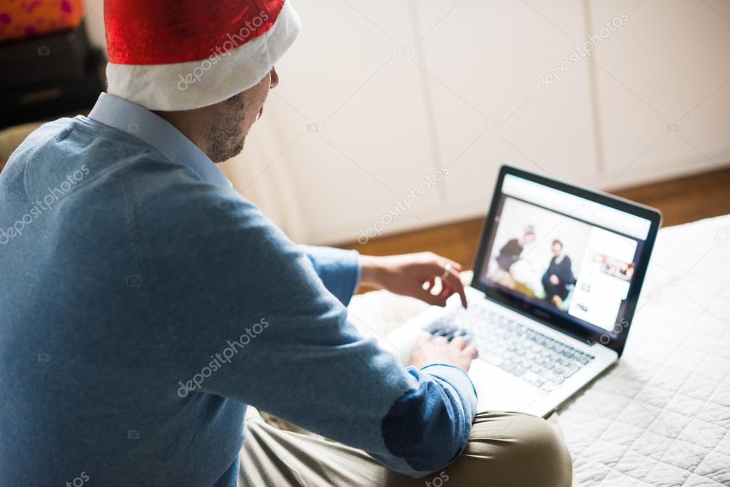 elegant business multitasking christmas man at home