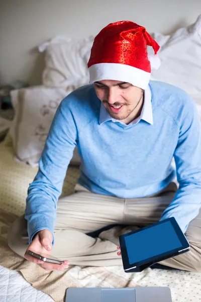 Elegant business multitasking christmas man at home — Stock Photo, Image