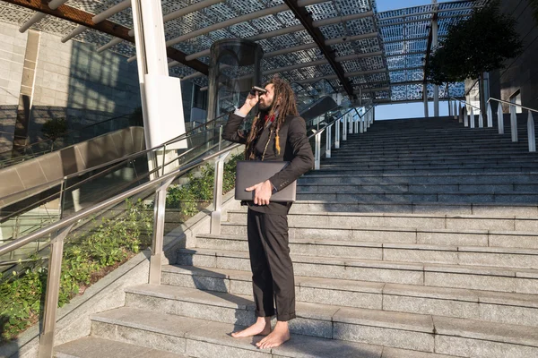 Stylish elegant dreadlocks businessman binoculars — Stock Photo, Image
