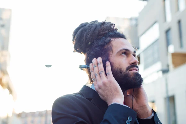 Stylish elegant dreadlocks businessman headphones — Stock Photo, Image