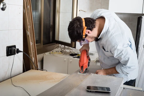 Young man bricolage working — Stock Photo, Image