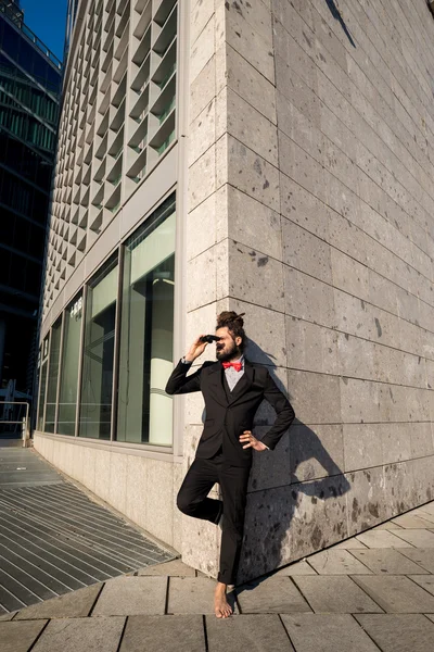 Stylish elegant dreadlocks businessman binoculars — Stock Photo, Image