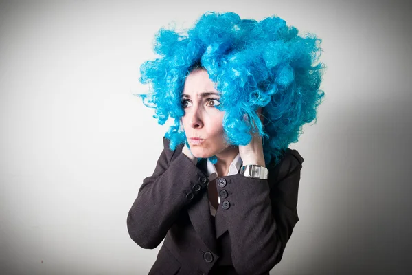 Funny blu wig beautiful young businesswoman — Stock Photo, Image