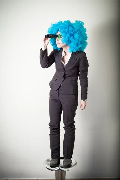 Funny blue wig beautiful young businesswoman — Stock Photo, Image