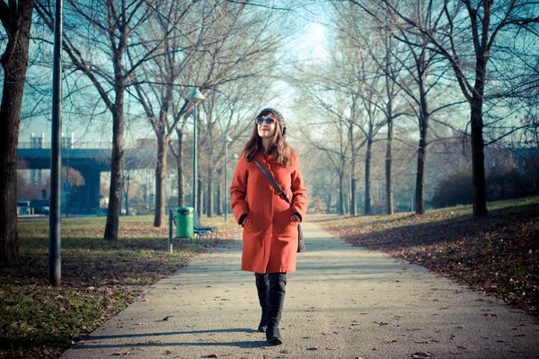 Beautiful woman red coat — Stock Photo, Image