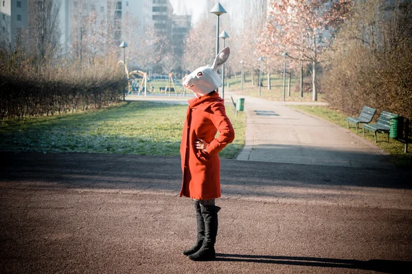 rabbit mask woman red coat
