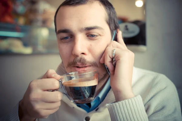 Multitasking man using tablet, laptop and cellhpone — Stock Photo, Image