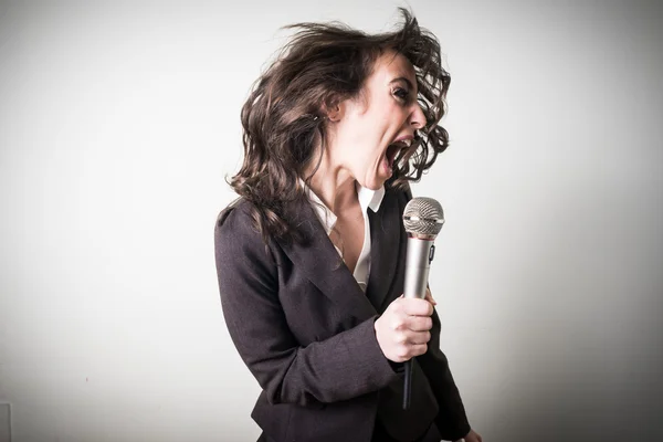 Singing beautiful young businesswoman — Stock Photo, Image