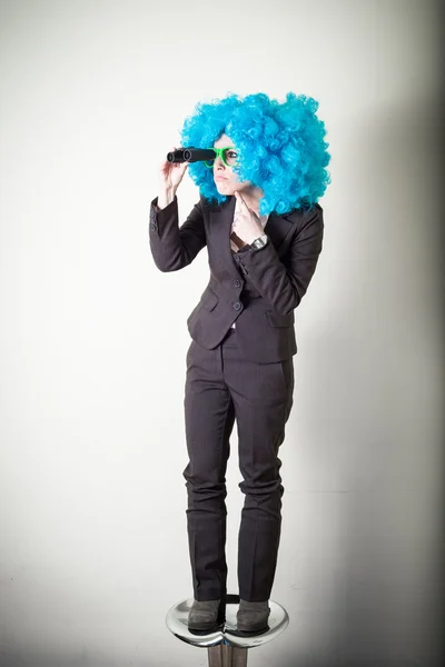 Funny blue wig beautiful young businesswoman — Stock Photo, Image