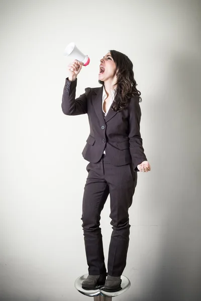 Bela jovem empresária com pouco megafone — Fotografia de Stock