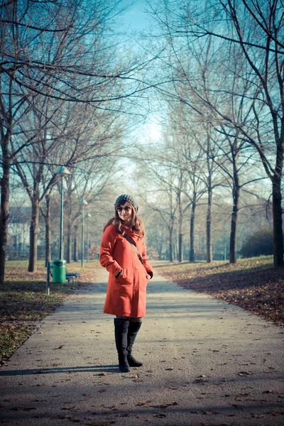 Beautiful woman red coat — Stock Photo, Image